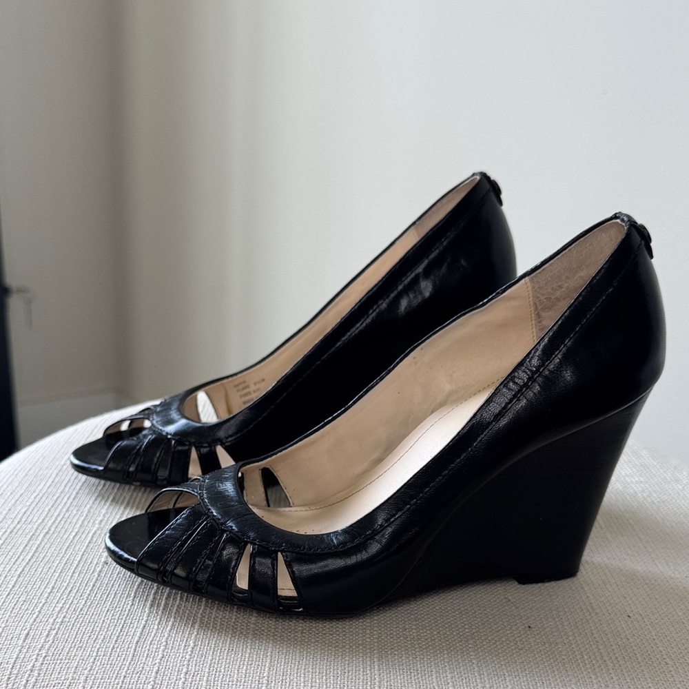 Calvin Klein Black Wedge Shoes. Side 6.5 . 0167